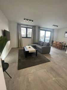 Posezení v ubytování Splendide appartement neuf à Zaventem airport