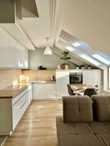 Η κουζίνα ή μικρή κουζίνα στο EASY RENT Apartments- CENTRUM Plac Litewski 2, 24h Check-in