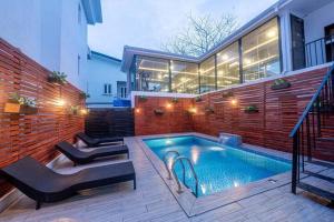 a swimming pool in the backyard of a house at George Residence Lekki, Lagos - with Pool in Lekki