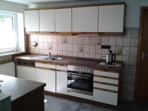Η κουζίνα ή μικρή κουζίνα στο Ferienwohnung bei Michels
