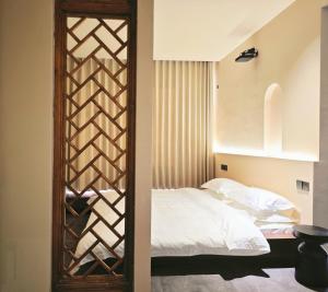 Letto o letti in una camera di 寺外茶宿SiWai tea&house