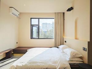 Letto o letti in una camera di 寺外茶宿SiWai tea&house