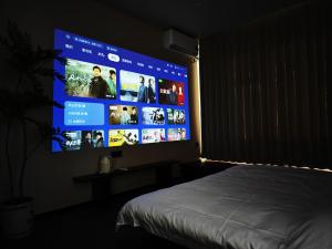 TV a/nebo společenská místnost v ubytování 寺外茶宿SiWai tea&house