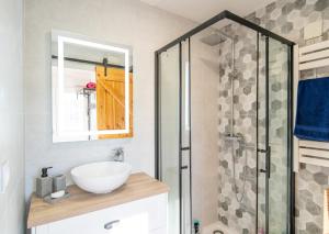 a bathroom with a sink and a shower at El Rinconcito in Jávea +11 photos