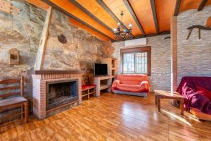 Μια τηλεόραση ή/και κέντρο ψυχαγωγίας στο Casa Rural La Jirola-El Balcón