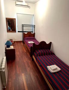 Katil atau katil-katil dalam bilik di Duplex familiar Nivel Superior