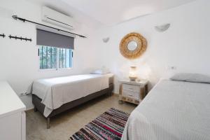 Postel nebo postele na pokoji v ubytování Villa La Gomera