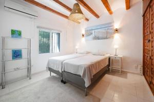Postel nebo postele na pokoji v ubytování Villa La Gomera + 20 fotografií