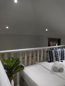 A bed or beds in a room at Green House Skiathos