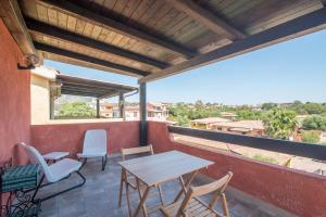 A balcony or terrace at Villetta - Aliterno V5