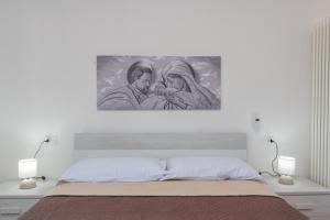 A bed or beds in a room at Villetta - Aliterno V5
