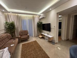 Μια τηλεόραση ή/και κέντρο ψυχαγωγίας στο مدينتي +5 φωτογραφίες
