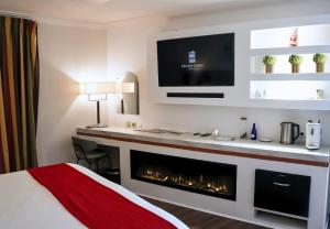 Kuchyň nebo kuchyňský kout v ubytování Grand Tonic Hotel & SPA NUXE