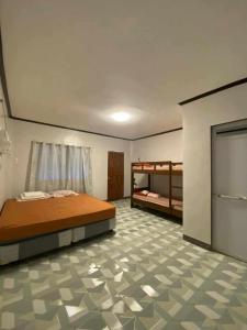 Postel nebo postele na pokoji v ubytování 4A's Lodging