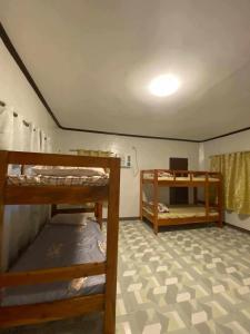 Postel nebo postele na pokoji v ubytování 4A's Lodging