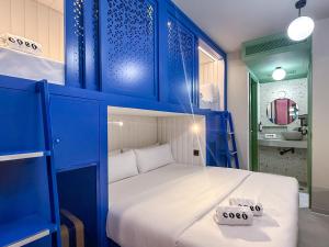 Katil atau katil-katil dalam bilik di Coeo Hernan Ruiz Rooftop Pool Hostel