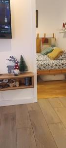 Postel nebo postele na pokoji v ubytování Apartman DETLIĆ Divčigora