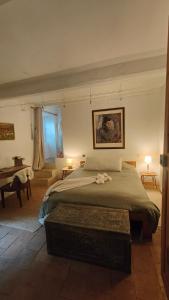 Postel nebo postele na pokoji v ubytování La Belle Epoque près de Nimes et Uzes
