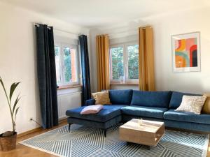 Area soggiorno di Gemütliche Wohnung in unmittelbarer Nähe zum See