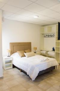 Postel nebo postele na pokoji v ubytování Don Pedro Apart Hotel + 19 fotografií