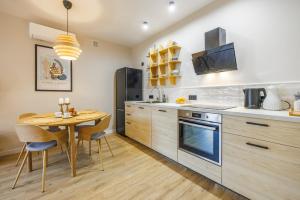 Kuchyň nebo kuchyňský kout v ubytování Butique Apartament - Old Town
