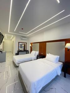 Jerash Hotel客房内的一张或多张床位