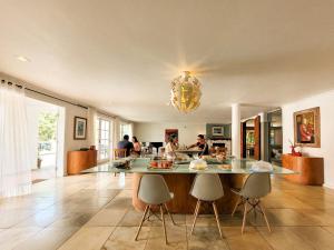 a kitchen with a large island in a house at Resort La Marina in Búzios