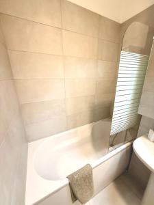 Koupelna v ubytování RULU Studio Plaza Mall + 12 fotografií