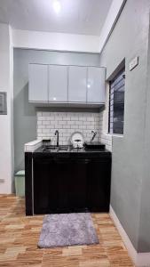 Kuchyň nebo kuchyňský kout v ubytování Bangketa Apartments + 15 fotografií