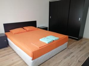 A bed or beds in a room at Incanto Apartments Még 29 kép