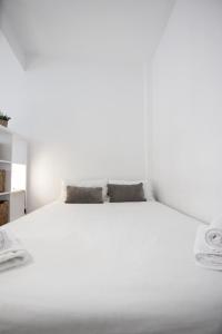 Posteľ alebo postele v izbe v ubytovaní RentalSevilla Santa Rufina