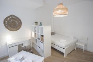 Posteľ alebo postele v izbe v ubytovaní RentalSevilla Santa Rufina