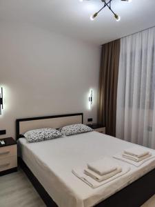 Postel nebo postele na pokoji v ubytování Apartment on Sayat Nova 33