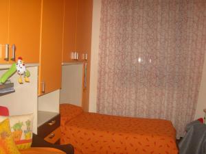 Casa Via Magenta tesisinde bir odada yatak veya yataklar
