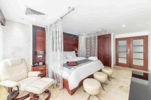 Cama o camas de una habitación en Hodelpa Gran Almirante