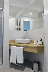 Koupelna v ubytování Hotel HE ROMA