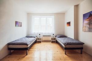 Posteľ alebo postele v izbe v ubytovaní Skodova 4 Apartments