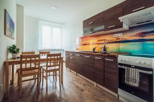 Kuchyňa alebo kuchynka v ubytovaní Skodova 4 Apartments