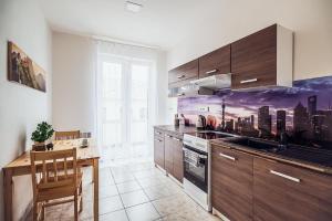 Kuchyňa alebo kuchynka v ubytovaní Skodova 4 Apartments