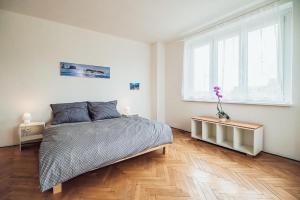 Posteľ alebo postele v izbe v ubytovaní Skodova 4 Apartments