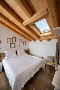 Rúm í herbergi á Borgo Paolin - Camere in vigna