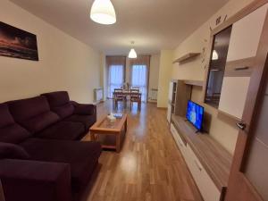 Μια τηλεόραση ή/και κέντρο ψυχαγωγίας στο Apartamento onda atlántica