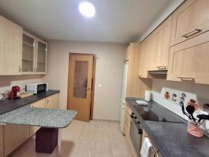 Η κουζίνα ή μικρή κουζίνα στο Apartamento onda atlántica +1 φωτογραφίες
