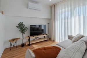 TV a/nebo společenská místnost v ubytování Simple Life II