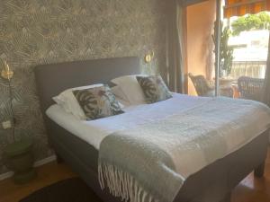 Кровать или кровати в номере Magnifique Appartement à Cassis,Parking,2 pas du Port
