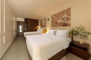 Ένα ή περισσότερα κρεβάτια σε δωμάτιο στο Zen House Ninh Bình