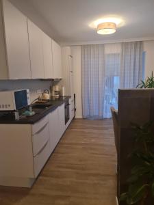 Dapur atau dapur kecil di Traumoase in Timmendorfer Strand