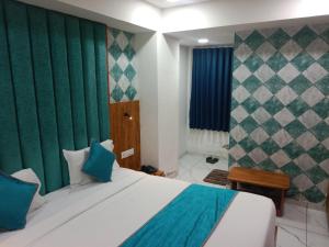 Postel nebo postele na pokoji v ubytování Hotel Lemon Gota