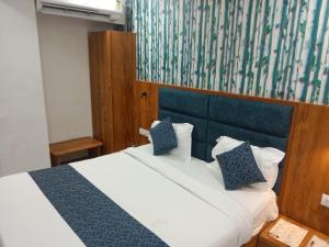 Postel nebo postele na pokoji v ubytování Hotel Lemon Gota + 8 fotografií