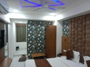 Postel nebo postele na pokoji v ubytování Hotel Lemon Gota